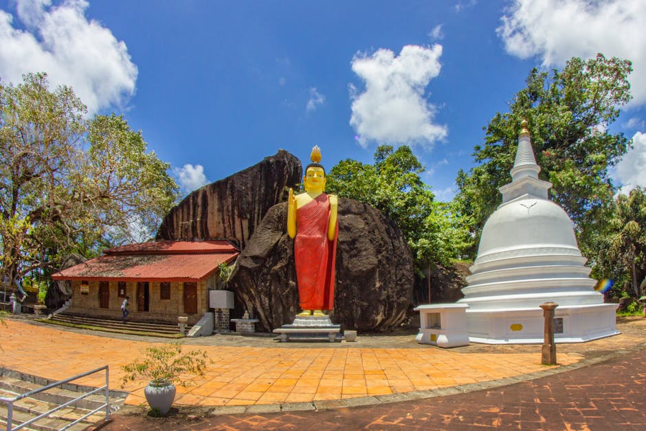 Buddhist temple with giant Buddha statue in Unawatuna, Southern Sri Lanka, a popular spiritual site.