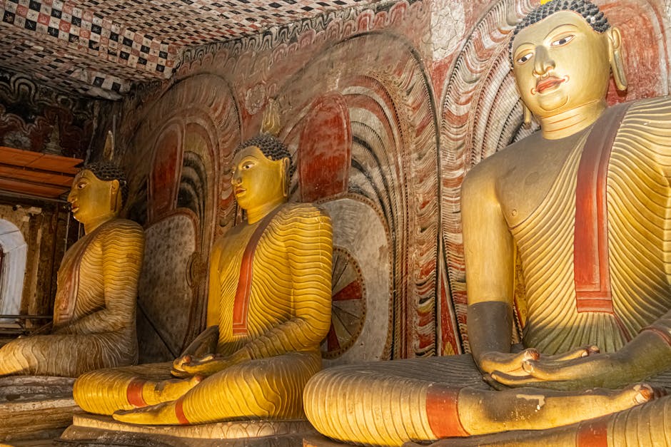 A captivating view of the intricately carved Buddha statues inside the historic Dambulla Cave Temple in Sri Lanka.